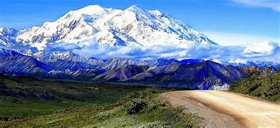 snow mountain and green grass