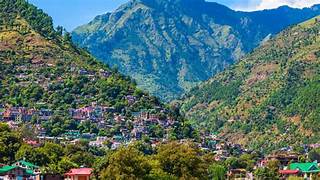 big mountain and multiple house in mountain